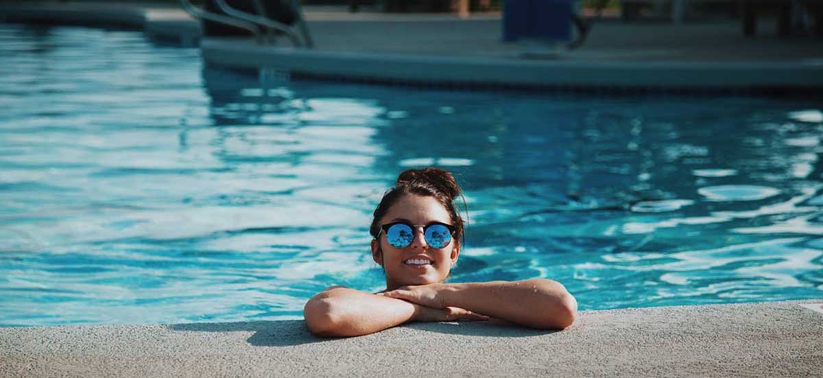 Swimmer at edge of pool in Phoenix Swimmer at edge of pool in Phoenix