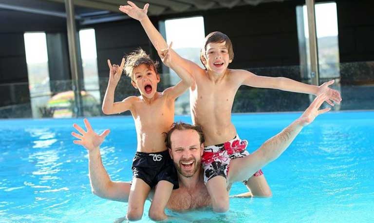 Family Enjoying A Leak Free Pool in Mesa Family Enjoying A Leak Free Pool in Mesa